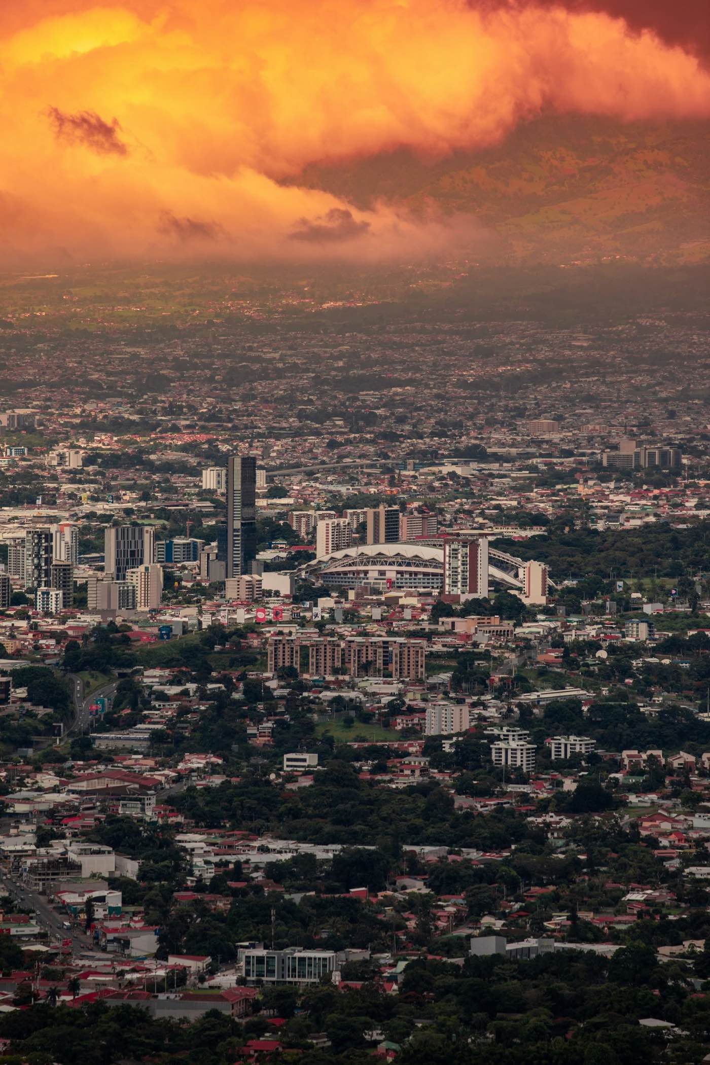 San Jose Costa Rica skyline at sunset with mountains in the background